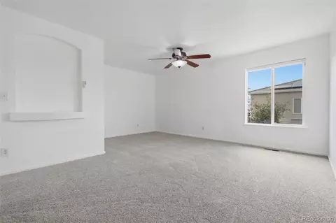 Living - 3897 Lisbon St, Denver, CO 80249 photo 7 of 9