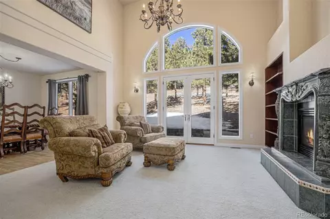 Living - 7567 S Settlers Dr, Morrison, CO 80465 photo 1 of 10