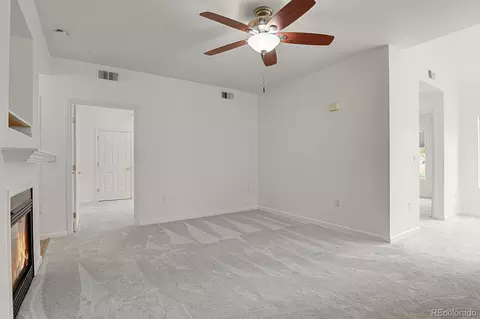 Living - 18284 E Floyd Ave #A, Aurora, CO 80013 photo 2 of 4