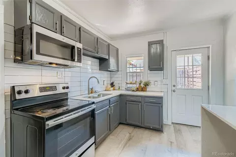 Kitchen - 9541 E 16th Ave, Aurora, CO 80010 photo 1 of 2