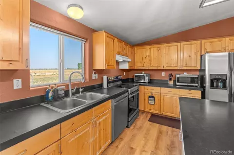 Kitchen - 9 E Ranch Rd, Wiggins, CO 80654 photo 4 of 7
