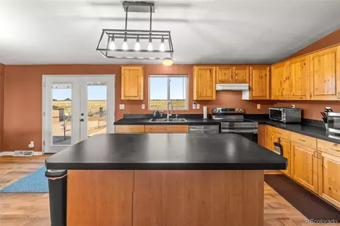 Kitchen - 9 E Ranch Rd, Wiggins, CO 80654 photo 5 of 7