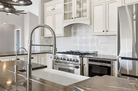 Kitchen - 50950 E Maplewood Pl, Bennett, CO 80102 photo 4 of 7