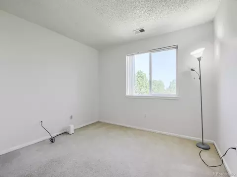 Bedroom - 19355 E 58th Dr, Aurora, CO 80019 photo 2 of 6