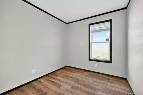 Bedroom - 6255 N Ramah Hwy, Yoder, CO 80864 photo 3 of 6