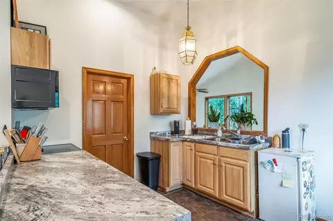 Kitchen - 8774 Spring Dr, Conifer, CO 80433 photo 6 of 7