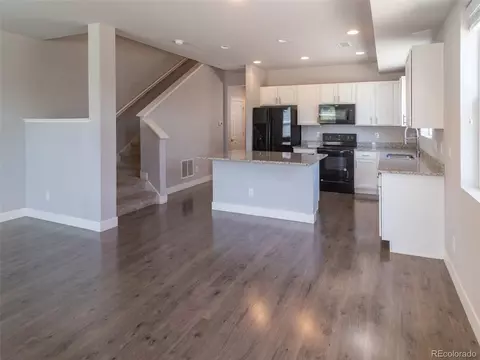 Living - 16069 Elk Dr, Denver, CO 80239 photo 3 of 3