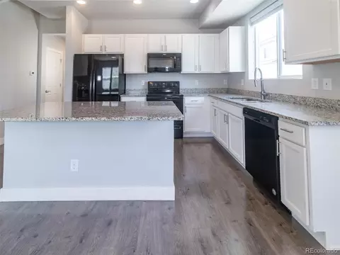 Kitchen - 16069 Elk Dr, Denver, CO 80239 photo 2 of 3