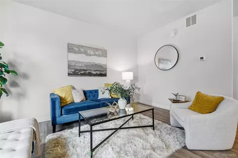 Living - 12940 Jasmine St #E, Thornton, CO 80602 photo 4 of 4