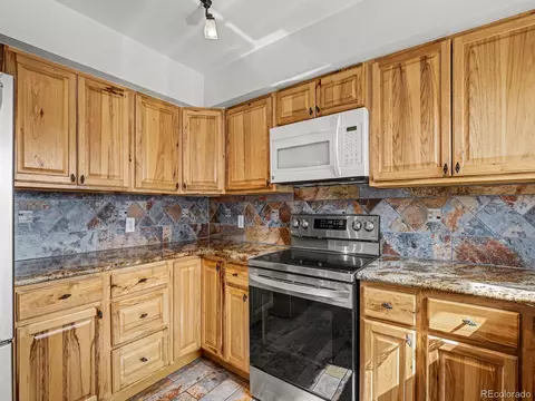 Kitchen - 14864 E Warren Ave, Aurora, CO 80014 photo 2 of 2