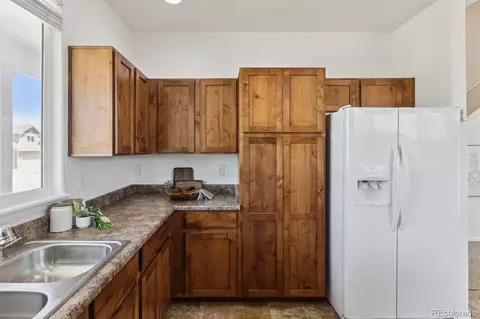 Kitchen - 727 Elk Mountain Dr, Windsor, CO 80550 photo 4 of 6