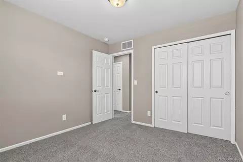 Bedroom - 16195 E Warner Dr, Denver, CO 80239 photo 8 of 9
