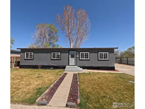218 Crest Dr, Log Lane Village, CO 80705
