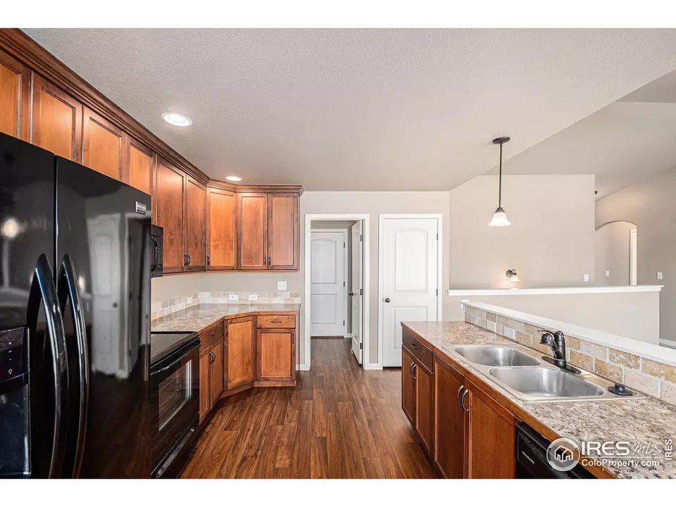 Kitchen - 141 Linden Oaks Dr, Ault, CO 80610 photo 2 of 3