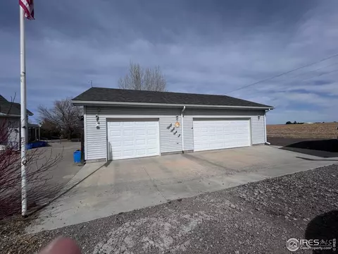 Exterior - 717 3rd Ave, Wiggins, CO 80654 photo 5 of 9