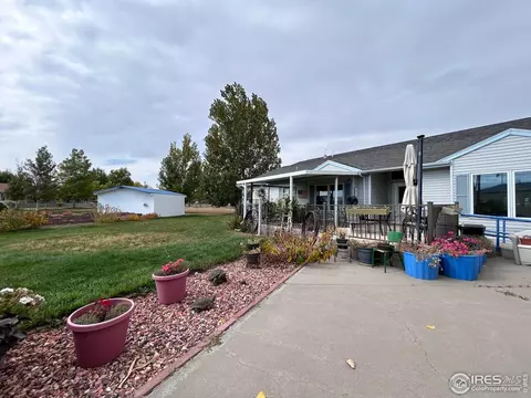 Exterior - 717 3rd Ave, Wiggins, CO 80654 photo 8 of 9