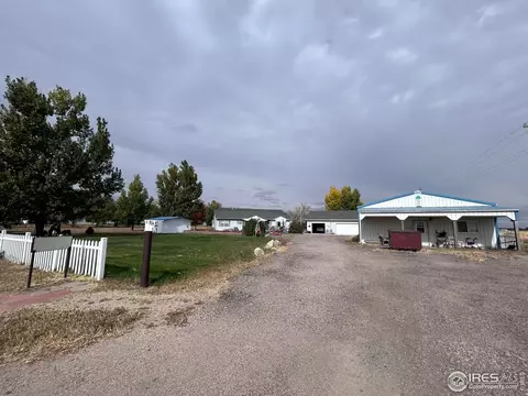 Exterior - 717 3rd Ave, Wiggins, CO 80654 photo 4 of 9