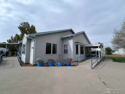 Exterior - 717 3rd Ave, Wiggins, CO 80654 photo 6 of 9