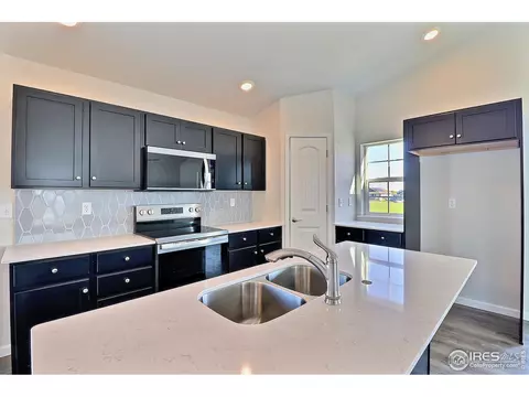 Kitchen - 4301 Rockcress Rd, Evans, CO 80620 photo 6 of 8