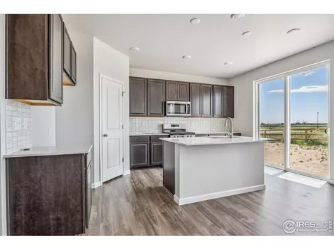 Kitchen - 882 Mesic Ln, Windsor, CO 80550 photo 2 of 3