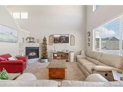 Living - 902 Maplebrook Dr, Windsor, CO 80550 photo 2 of 4