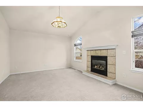 Living - 1507 Stonewood Ct, Windsor, CO 80550 photo 10 of 10