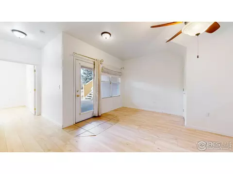 Living - 202 Lucca Dr, Evans, CO 80620 photo 6 of 7