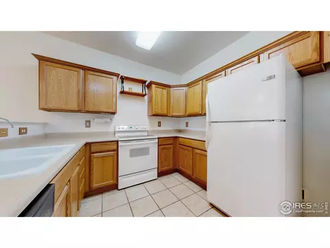 Kitchen - 202 Lucca Dr, Evans, CO 80620 photo 3 of 3