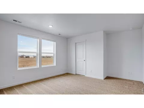 Bedroom - 386 Tailholt Ave, Severance, CO 80550 photo 11 of 13