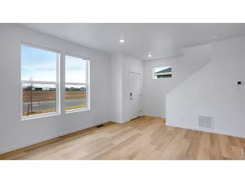 Living - 386 Tailholt Ave, Severance, CO 80550 photo 1 of 2