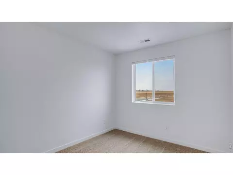 Bedroom - 386 Tailholt Ave, Severance, CO 80550 photo 6 of 13