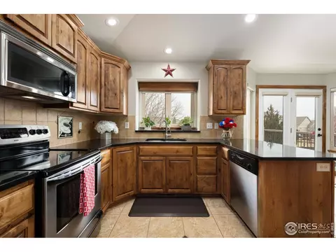 Kitchen - 2086 Cape Hatteras Dr, Windsor, CO 80550 photo 5 of 8