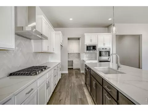 Kitchen - 1644 Sundown Run Dr, Windsor, CO 80550 photo 4 of 5