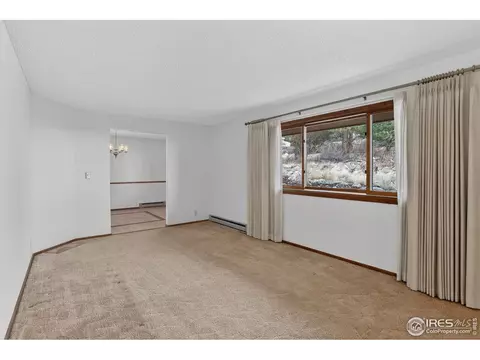 Living - 15655 Mossrock Dr, Longmont, CO 80503 photo 2 of 7