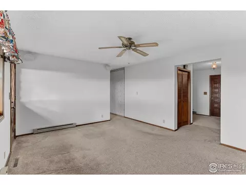 Living - 15655 Mossrock Dr, Longmont, CO 80503 photo 6 of 7