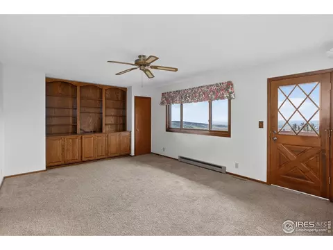 Living - 15655 Mossrock Dr, Longmont, CO 80503 photo 4 of 7