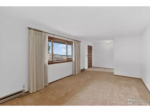 Living - 15655 Mossrock Dr, Longmont, CO 80503 photo 1 of 7