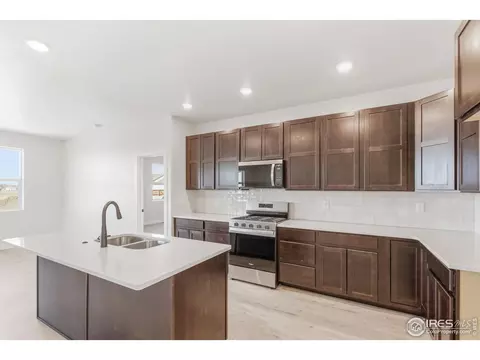 Kitchen - 105 7th Ave, Wiggins, CO 80654 photo 2 of 2