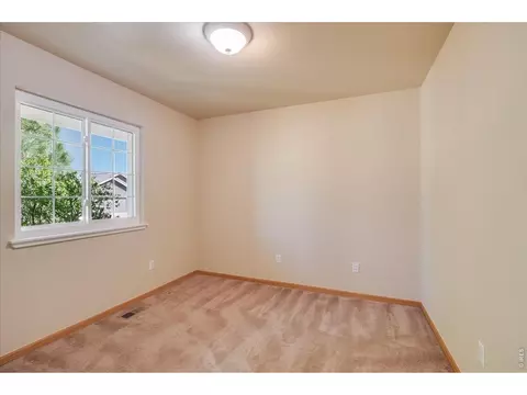 Bedroom - 883 Emerald Dr, Windsor, CO 80550 photo 2 of 6