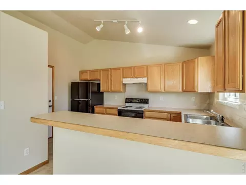 Kitchen - 883 Emerald Dr, Windsor, CO 80550 photo 4 of 5