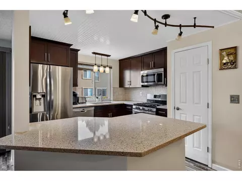 Kitchen - 8096 Lee Ct, Arvada, CO 80005 photo 3 of 6