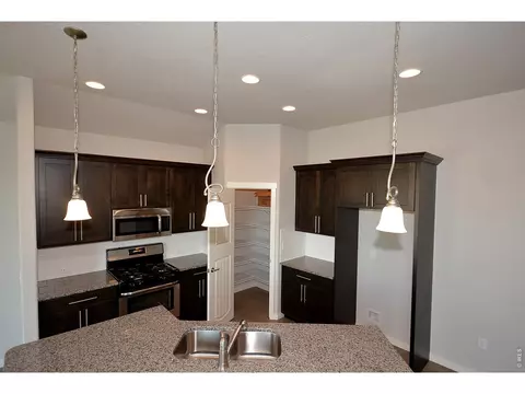 Kitchen - 1145 Bitterroot Ct, Johnstown, CO 80534 photo 10 of 10