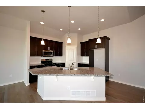 Kitchen - 1145 Bitterroot Ct, Johnstown, CO 80534 photo 7 of 10