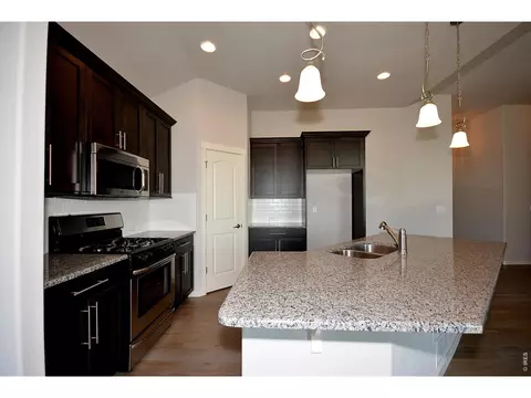 Kitchen - 1145 Bitterroot Ct, Johnstown, CO 80534 photo 6 of 10