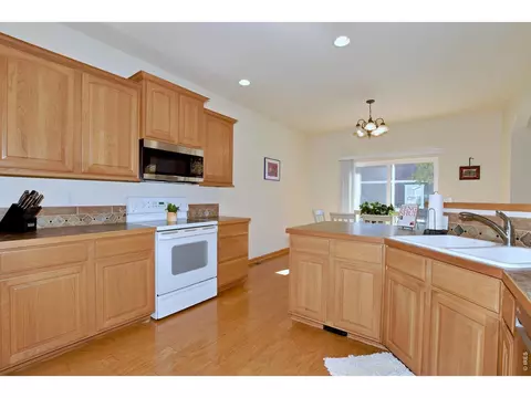 Kitchen - 1047 Canal Dr, Windsor, CO 80550 photo 4 of 5