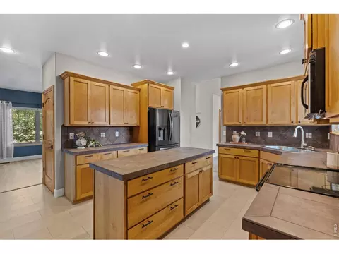 Kitchen - 2036 Vineyard Ct, Windsor, CO 80550 photo 2 of 3