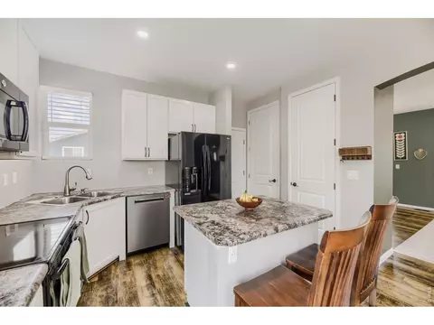 Kitchen - 715 Stonehaven St, Dacono, CO 80514 photo 2 of 3