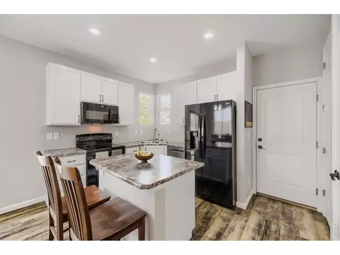 Kitchen - 715 Stonehaven St, Dacono, CO 80514 photo 3 of 3