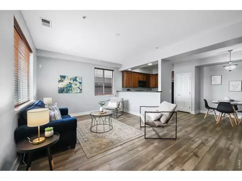 Living - 5034 Everett St #101, Arvada, CO 80002 photo 2 of 5