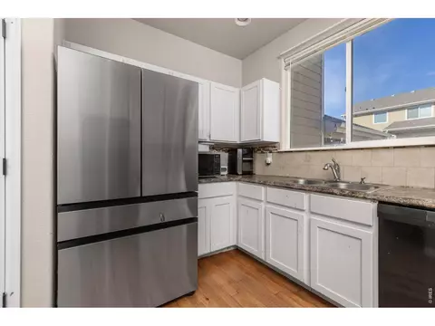 Kitchen - 805 Mt Sneffels Ave, Windsor, CO 80550 photo 3 of 4